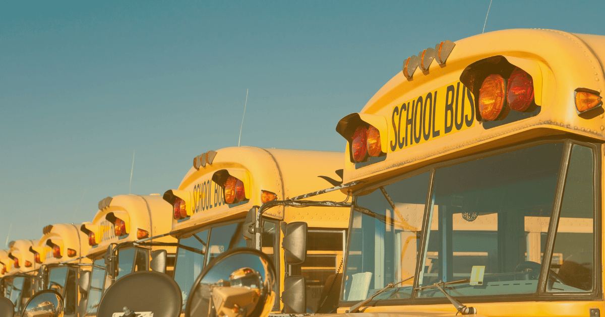 Artistic Image of Colorful Yellow School Buses Lined Up in a Row